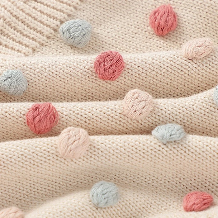 Baby girls knitted jumpsuit with pompoms